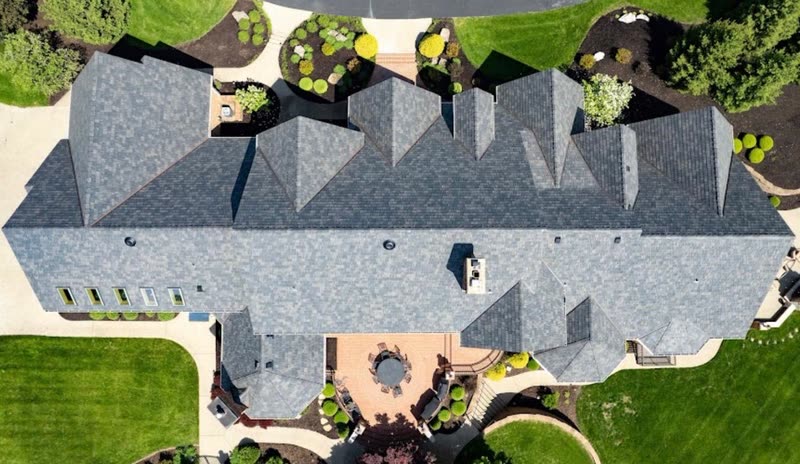 Overhead view of an estate roof showing every hip, valley and ridge in new shingle